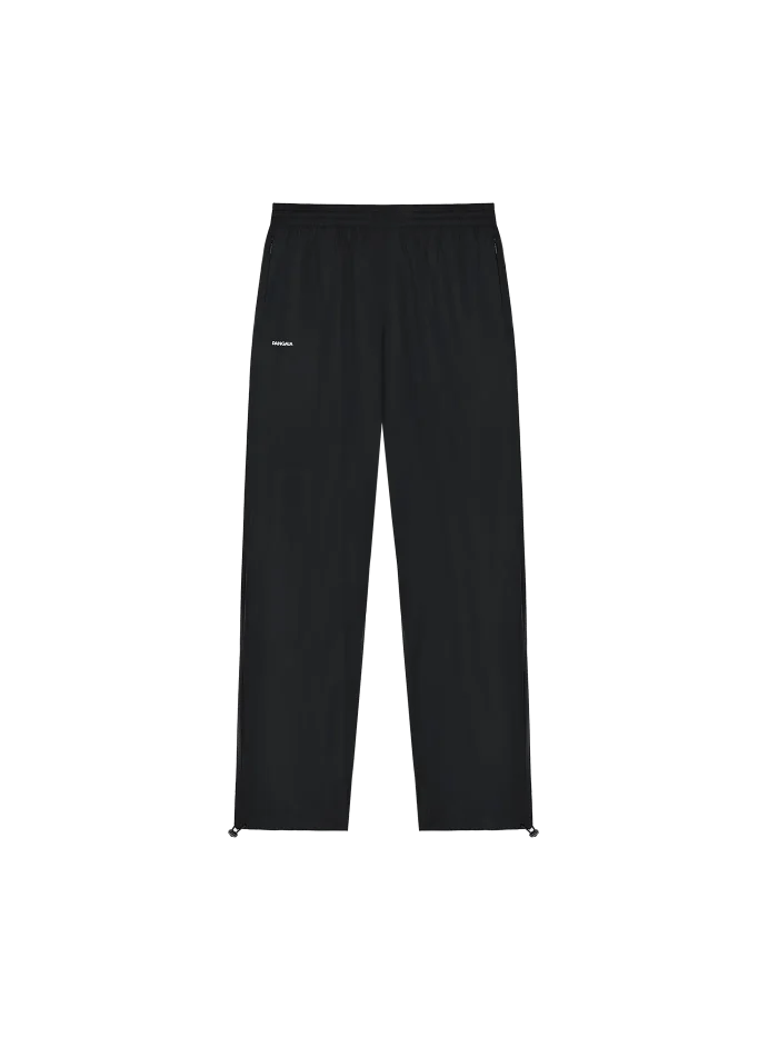 MENS DNA RECYCLED NYLON TRACK PANTS - BLACK